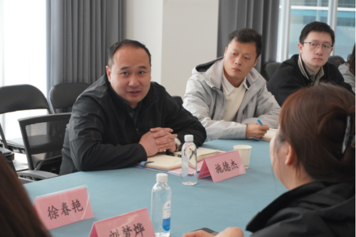 赴郑州西亚斯学院教育学院调研交流