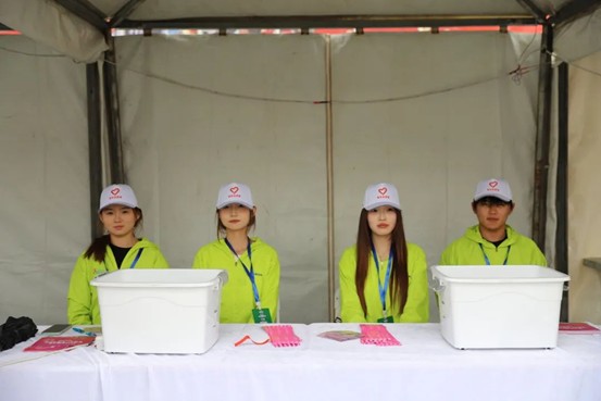 热血青春助跑未来”——Beat365唯一官方网站艺术学院志愿者为长城汽车智慧工厂半马蓄势添彩